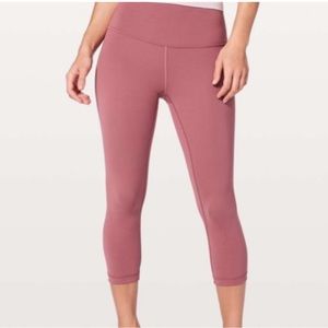 Used LuluLemon Wunder Crop Leggings in Size 6. 21” in a Pink/Red Color.